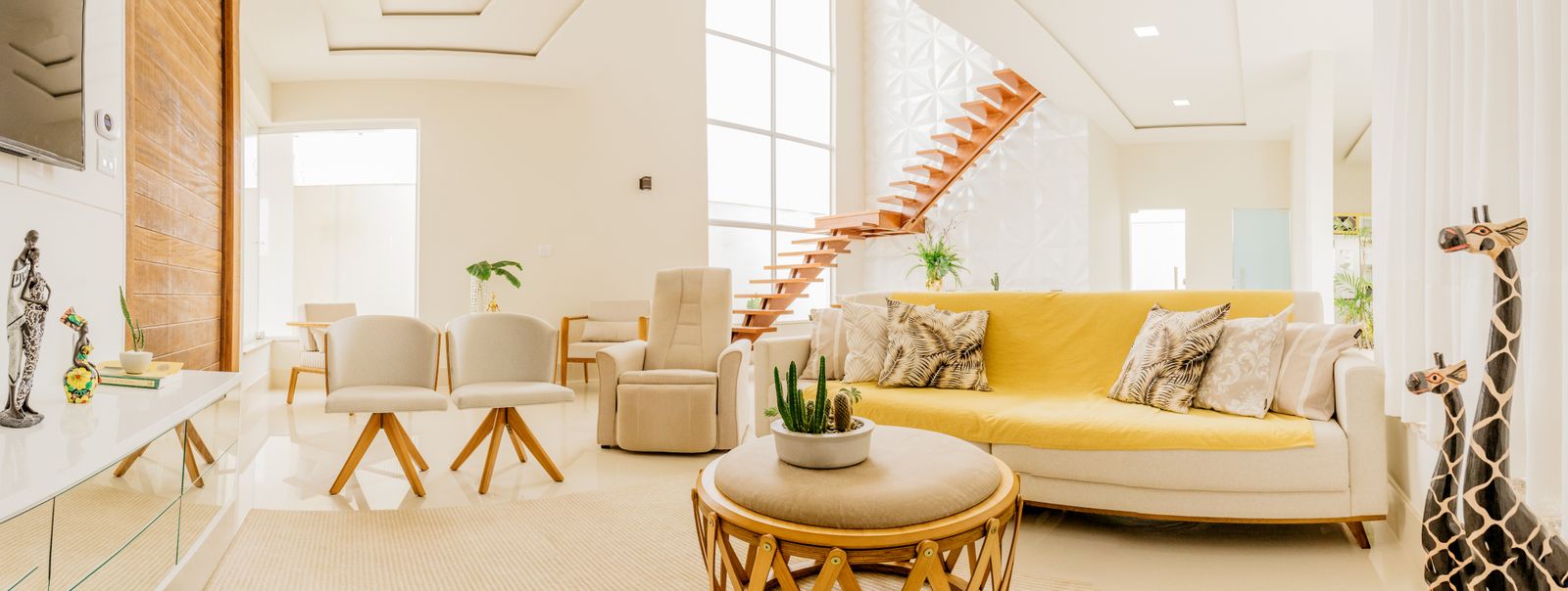 Bright living room carpet near a plant stand prone to rust stains