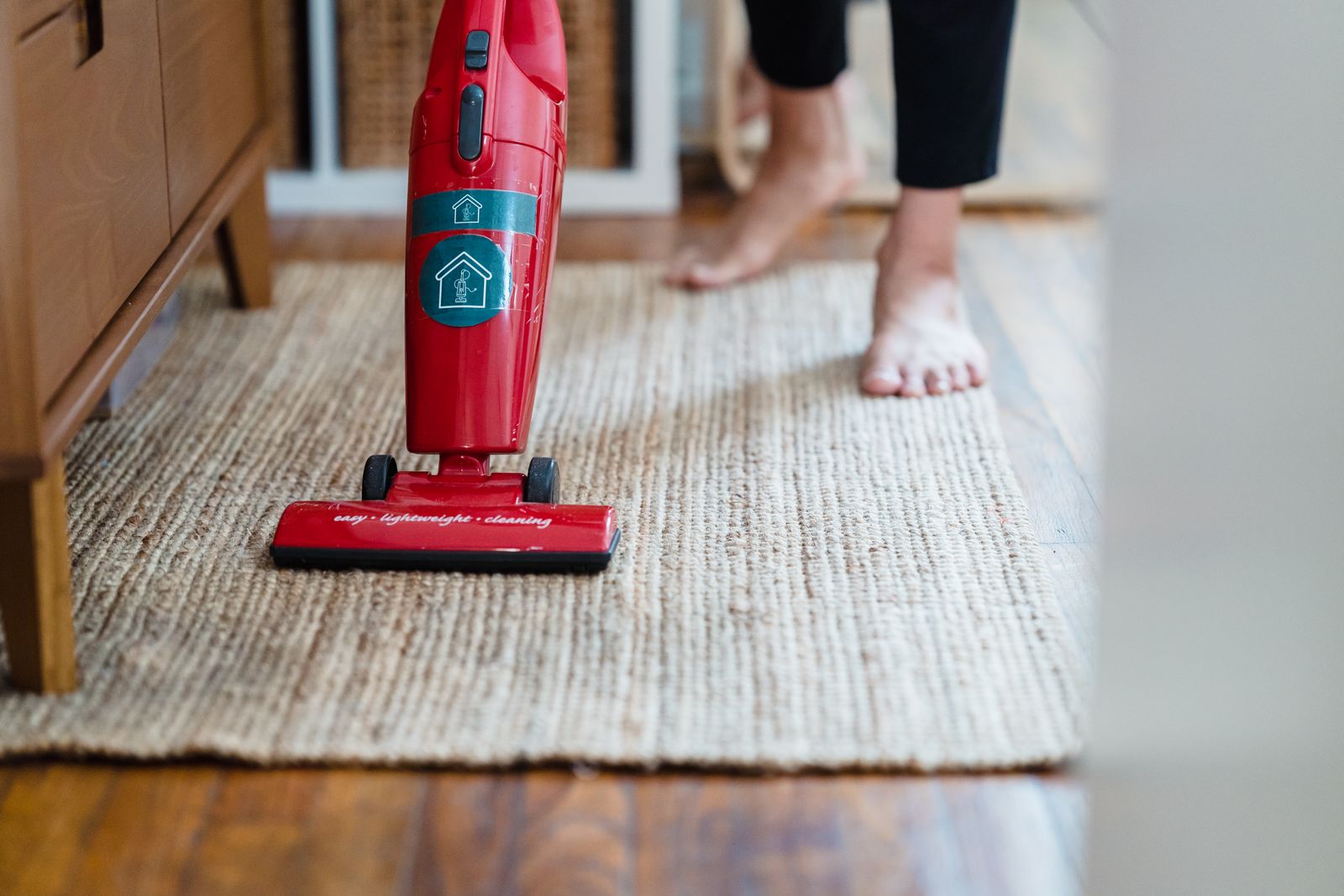Vacuuming a rug, comparing a robot vacuum vs a regular vacuum